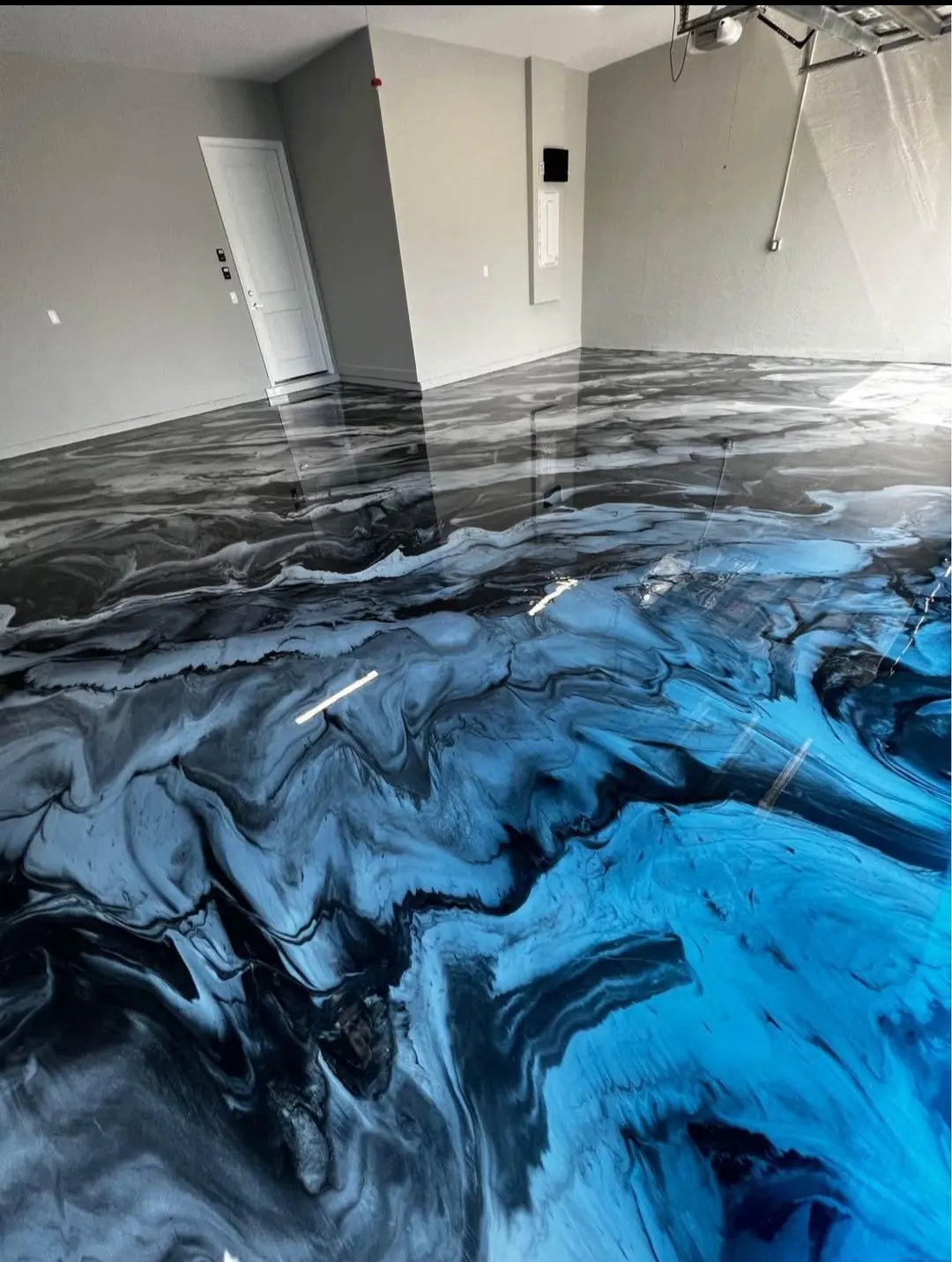 Blue and black marbled epoxy floor coating